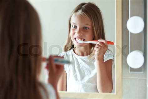 Girl Brushes Teeth Stock Image Colourbox