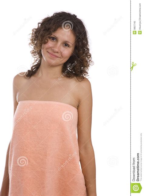 Woman Wrapped In A Peach Coloured Bath Towel Stock Image
