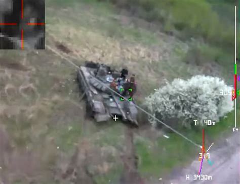 kamizake drone turns russian tank  ball  smoke