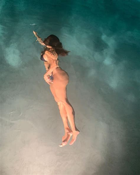 kourtney kardashian showed a photo from a night swim in