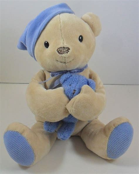 carters classics tan blue musical wind up teddy bear plush