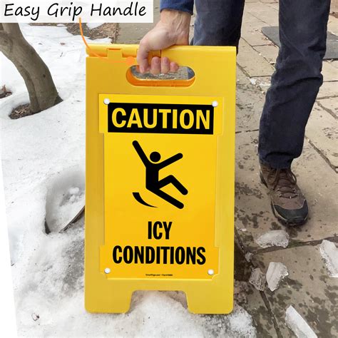caution icy conditions standing floor sign