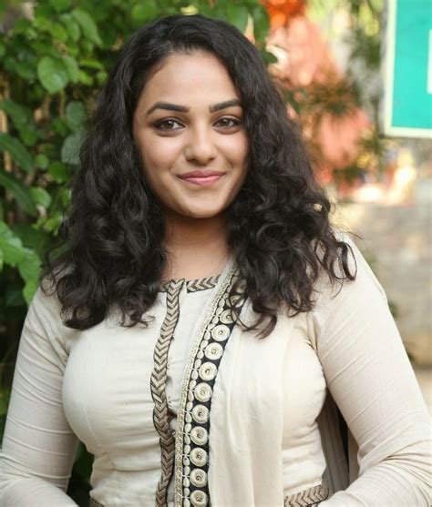 Nithya Menon Latest Photo Shoot Images At Ok Kanmani Images