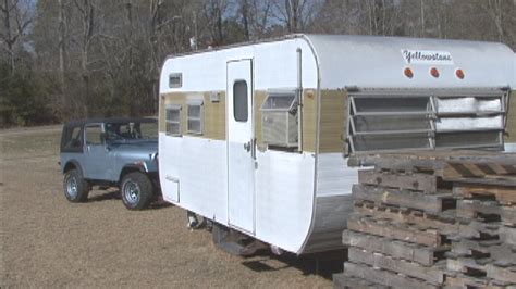 field   garage bringing  vintage trailer project home rv  rv