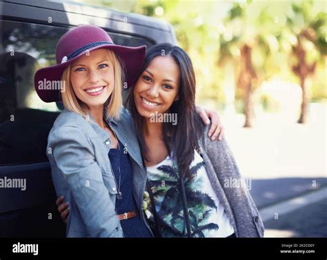 Bonding Between Beauties Portrait Of Two Young Female Friends Leaning