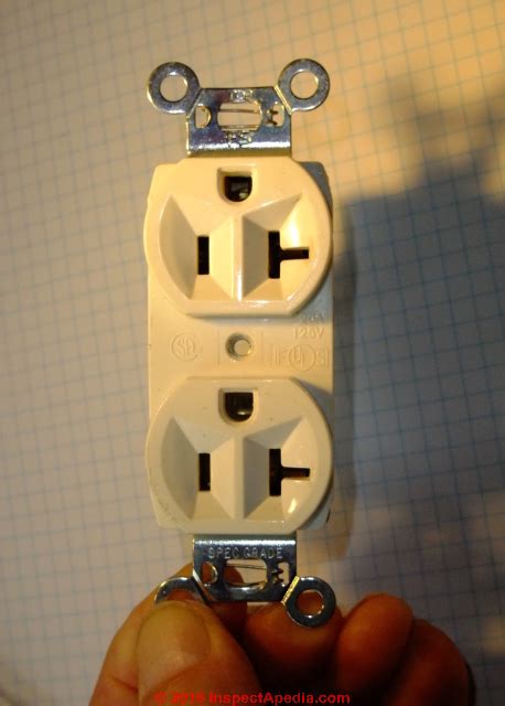 electrical receptacle arcing damage arc pitting   older electrical outlet