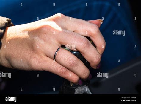 Close Up Shot Of A Womans Hand On The Gear Shifter While Driving The