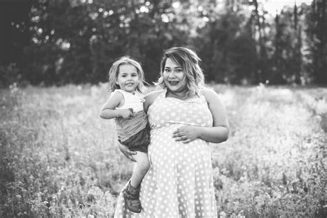 Pregnant Mom And Daughter In Flower Field Stock Image Image Of Cute