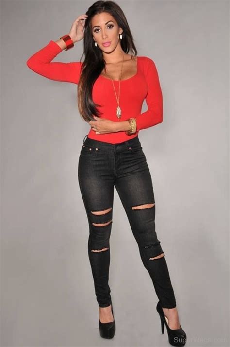 claudia sampedro in red top and black jeans super wags hottest wives and girlfriends of high