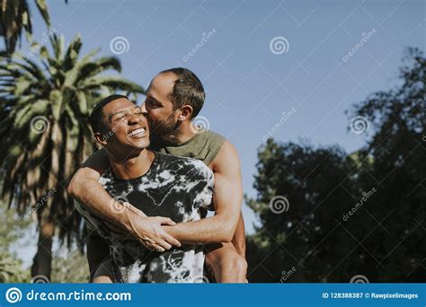 Gay Couple Hugging In The Park Stock Image Image Of Lgbtq Happiness