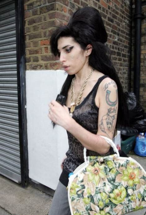 heavy make up fails to conceal the state of amy winehouse s deteriorating skin daily mail online