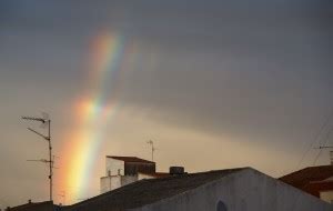 unusual rainbow  spain todays image earthsky