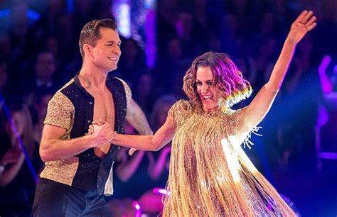 Strictly Come Dancing Caroline Lifts Glitterball Trophy