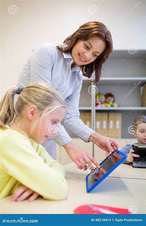 girl  teacher  tablet pc  school stock image image  classroom people