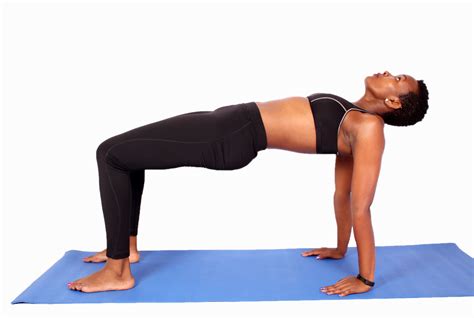 fit african woman  table maker yoga pose
