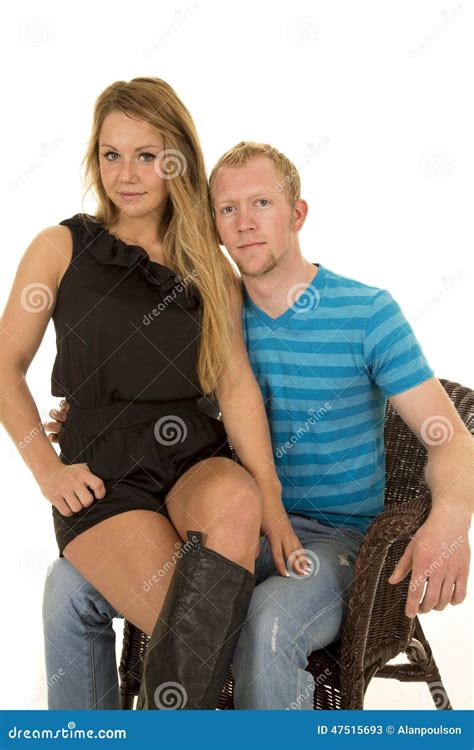 woman sitting on mans lap in chair stock image image of expression