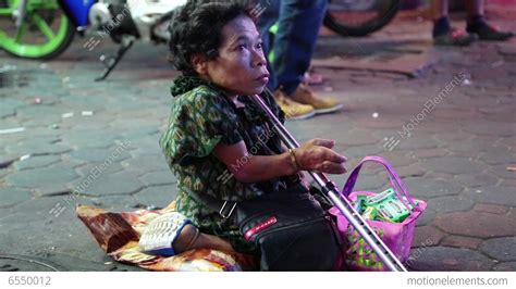 woman dwarf at walking street in pattaya thailand stock