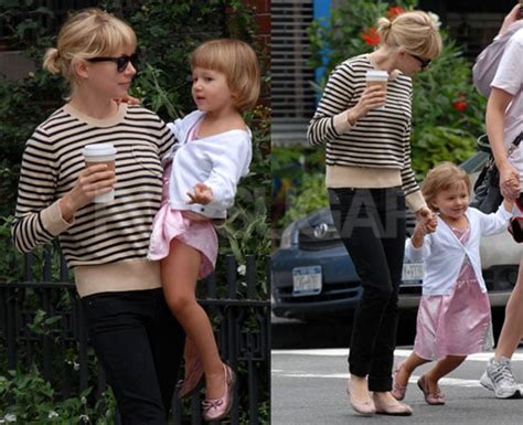 Michelle Holds On Tight To Her Adorable Girly Matilda Popsugar Celebrity
