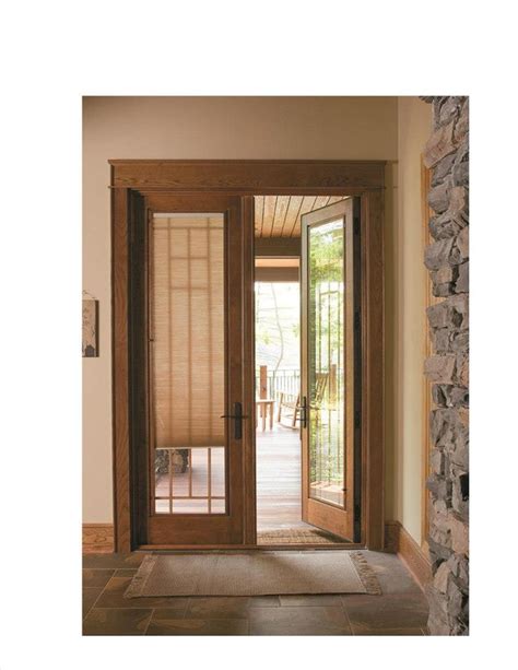 pella designer series hinged patio door windows doors pinterest