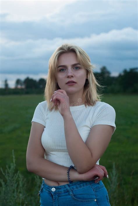 Portrait Of Beautiful Blonde Outdoors Young Blonde Posing Outdoors