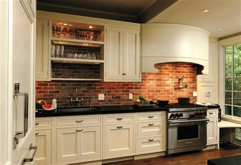 cream cabinets brick wall black counter  kitchen trendy kitchen backsplash brick backsplash