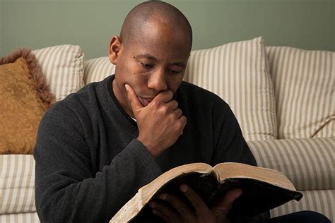 Guy Reading Bible Breaking News On Christianity In