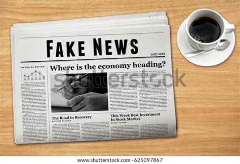 newspaper showing fake news headline stock photo  shutterstock
