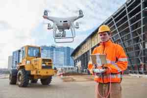 drone operated  construction worker  building site sgtc