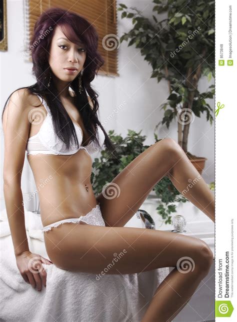 beautiful asian women in white lingerie royalty free stock