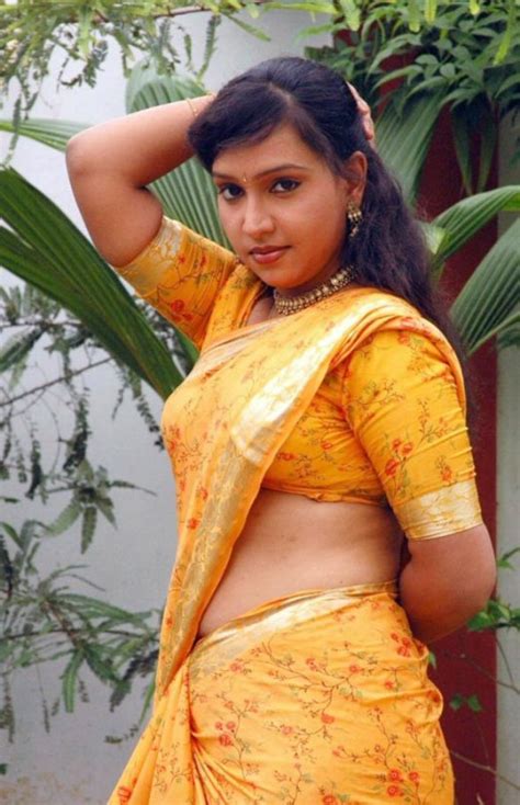 lalitha tamil tv actress hot saree stills pics photoshoot yellow blouse