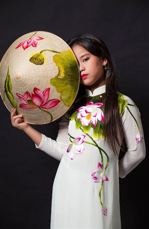 The Beauty Of Vietnamese Silk Ao Dai With Lotus Flower In The Contest