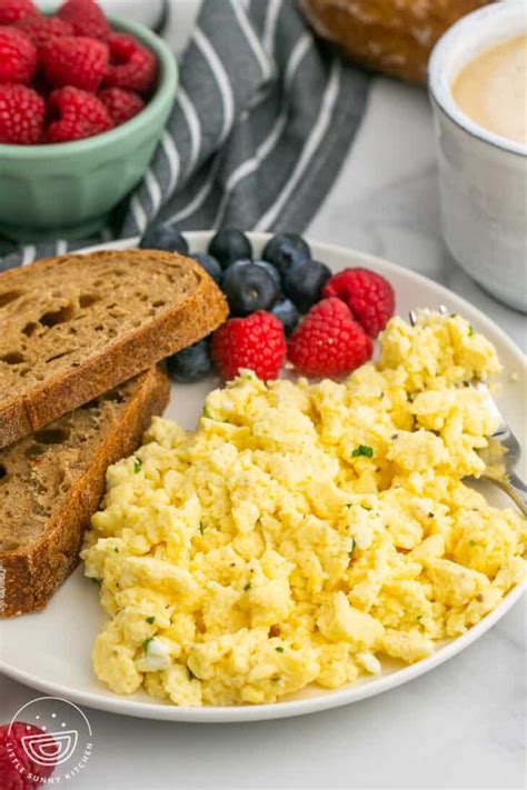 fluffy scrambled eggs  cottage cheese  sunny kitchen