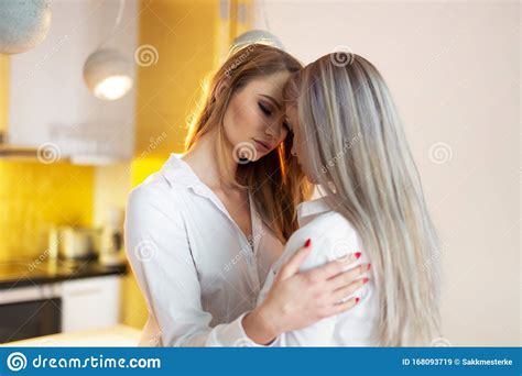 Sensaul Moments Of Lesbian Couple In Kitchen Stock Image Image Of