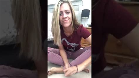woman takes off socks to show off feet youtube