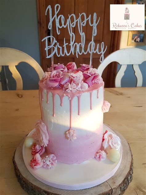 pink  white drip cake  edible hand  decorations pretty