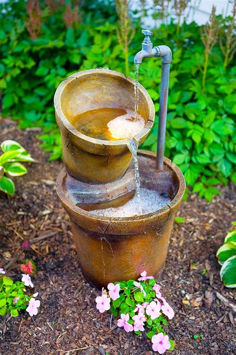 upcycled water features      garden fountain