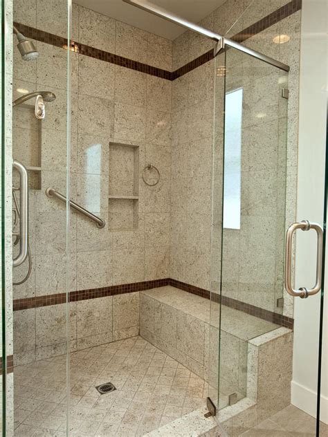 modern glass shower with granite tile and bench hgtv