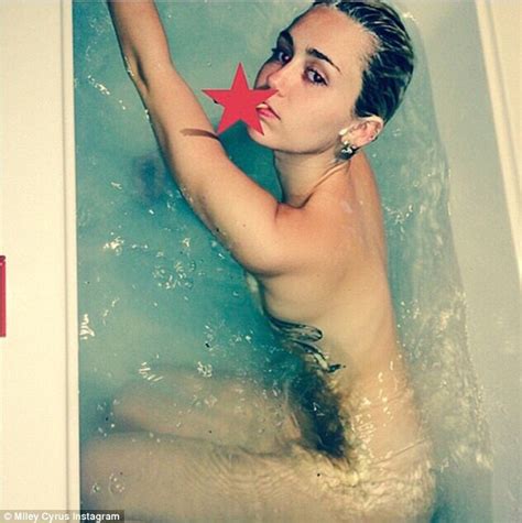 miley cyrus goes topless on instagram after posing naked in the bathtub daily mail online