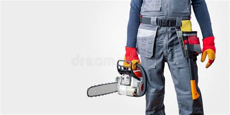 man holding chainsaw stock photo image  glasses hair