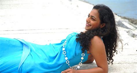 Nithya Menon Hot Stills In Beach Song Ala Modalaindi