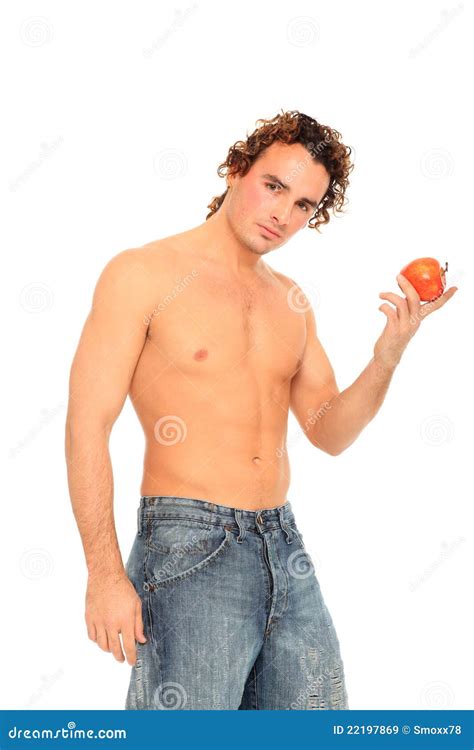 young man holding  apple stock image image  blue