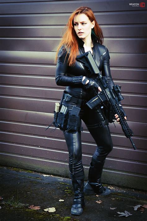 Wife Material Redhead In Tight Black Leather Catsuit Tactical Rifle