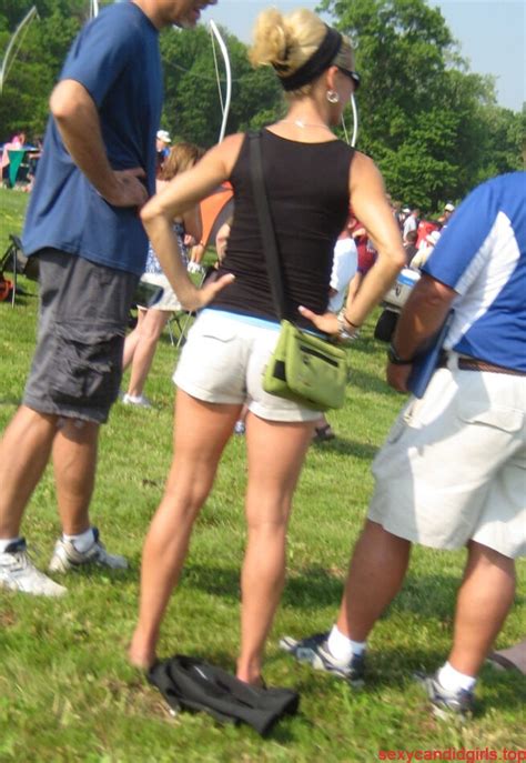 a nice candid skinny milf in white shorts with hot legs park creepshot