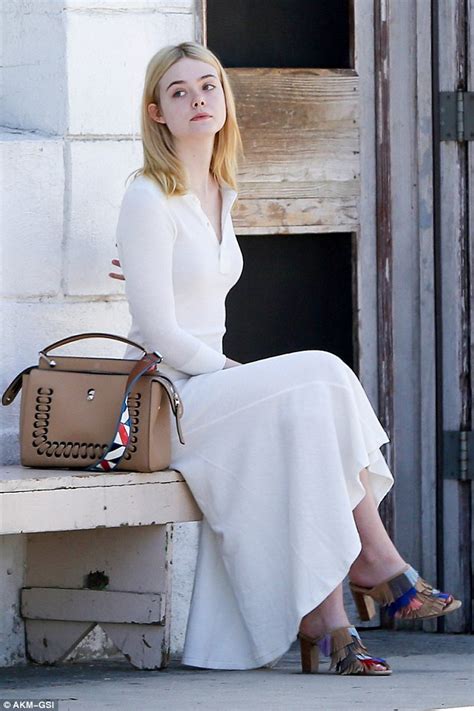 Elle Fanning Is The Epitome Of Elegance In Simple White Dress As She