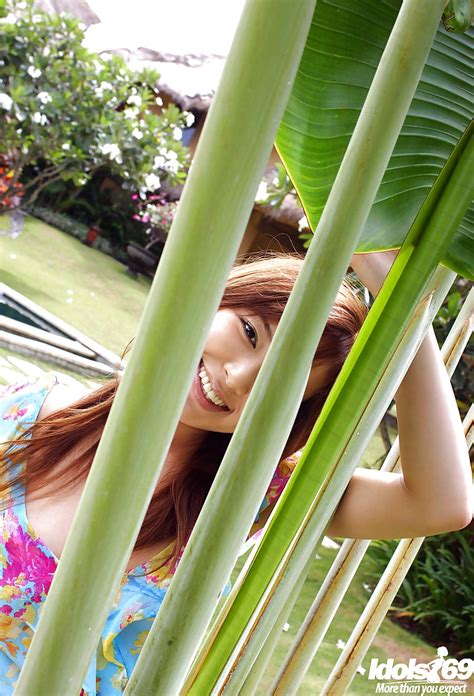 sweet amateur asian babe yua aida showcasing her tempting curves outdoor