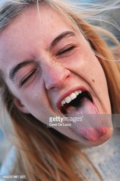 Girls Tongue Out Photos Et Images De Collection Getty Images