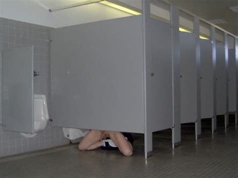 under bathroom stall gay sex cumception