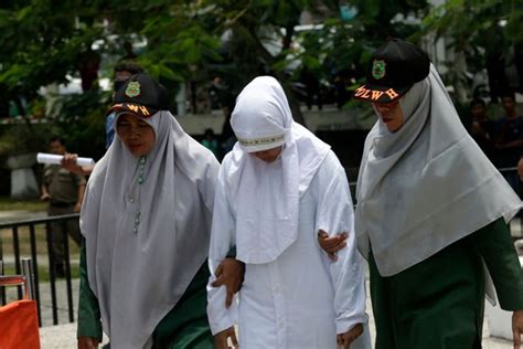 six women and men flogged for having sex outside of marriage in indonesia