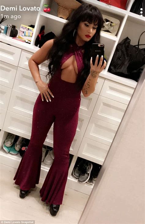demi lovato shows off cleavage as she dresses like selena daily mail online