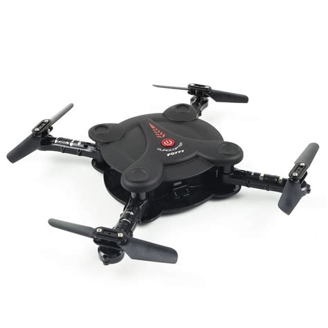 black  red remote controlled flying device   white surface   propellers attached